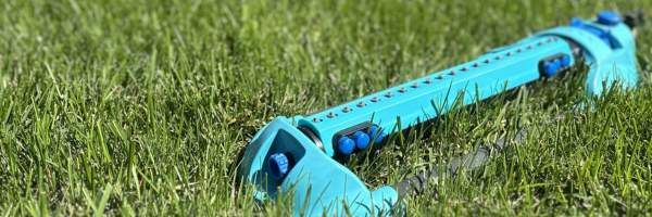 A sprinkler on an Edmonton lawn in the blistering mid-summer heat. 